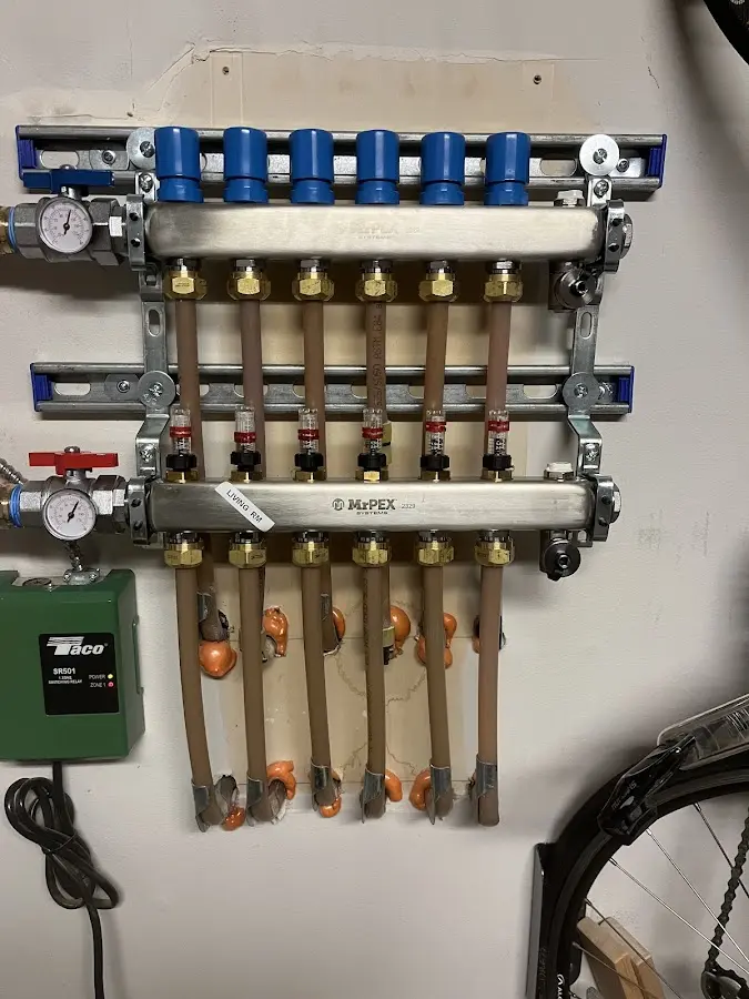 Plumber performing Water Heater Repair at a residential property in Tuscumbia