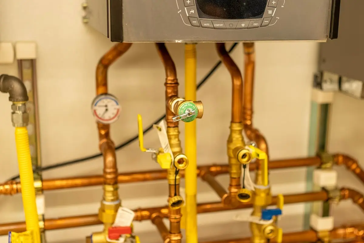 Licensed technician providing Backflow Prevention for a homeowner in Tuscumbia